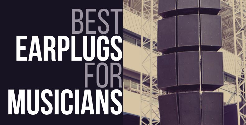 Large live concert speakers visible in the background, exactly the type of situation where best earplugs for musicians are extremely important and useful.