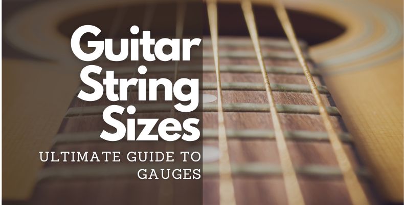 Guitar String Sizes: Looking down at an acoustic guitar's neck with the neck, strings and the guitar's sound hole visible.