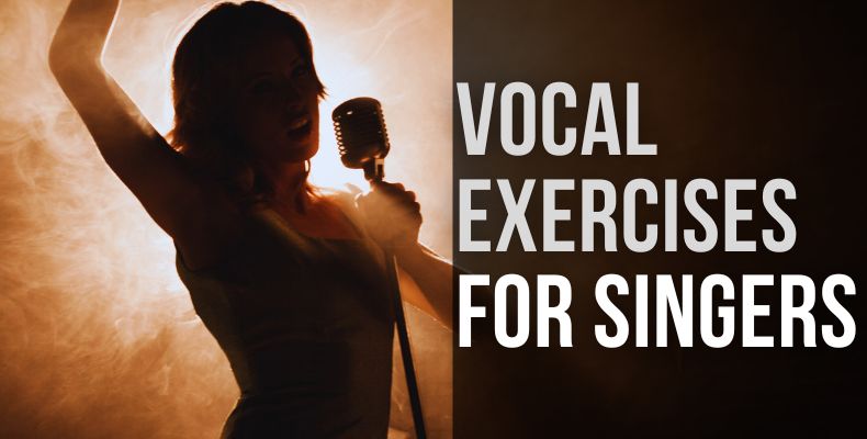 15+ Best Daily Vocal Exercises For Singers: A singer performing on a stage in front of the stage lights, holding a microphone.