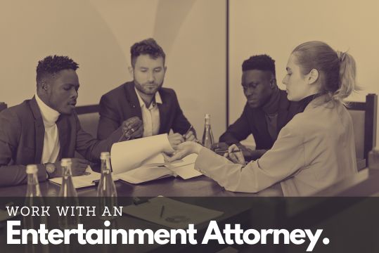 Work with an entertainment attorney. They will help you navigate the contract, negotiate the terms, and ensure your best interests are protected.