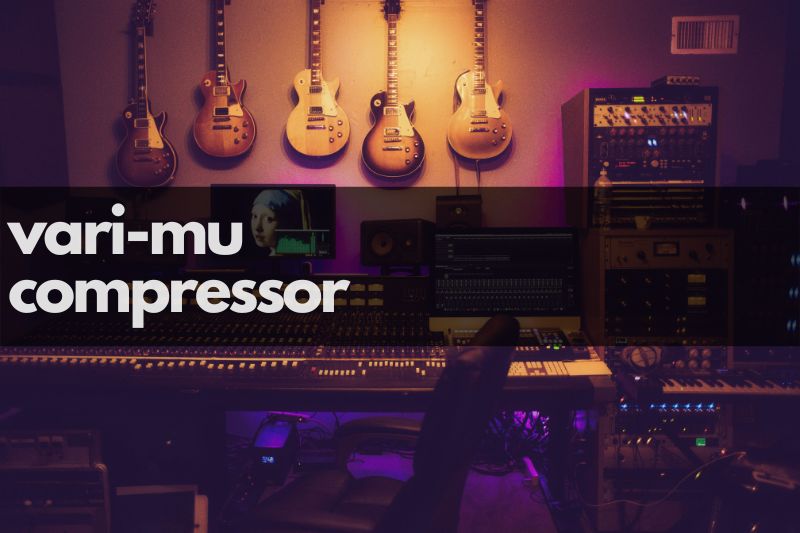 Vari Mu Compressor Guide: A mixing desk, racks of studio gear and guitars in a professional recording studio.