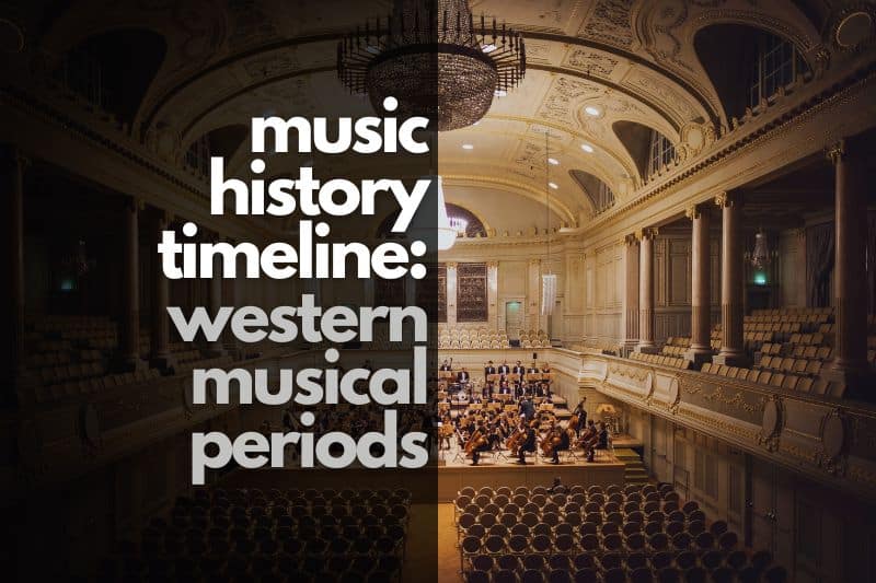 Music history timeline: An orchestra practicing on the stage of a historic concert hall with beautiful pillars and a chandelier
