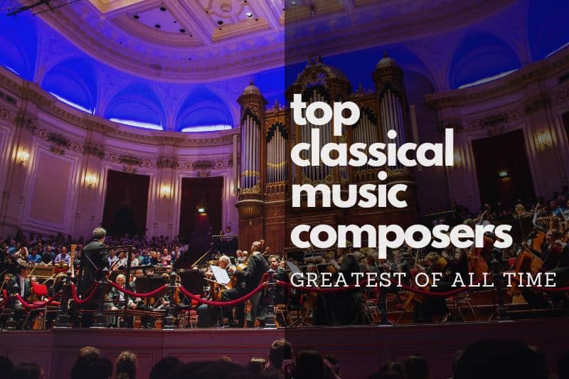 Top classical music composers: An orchestra performing on the stage of a concert hall.