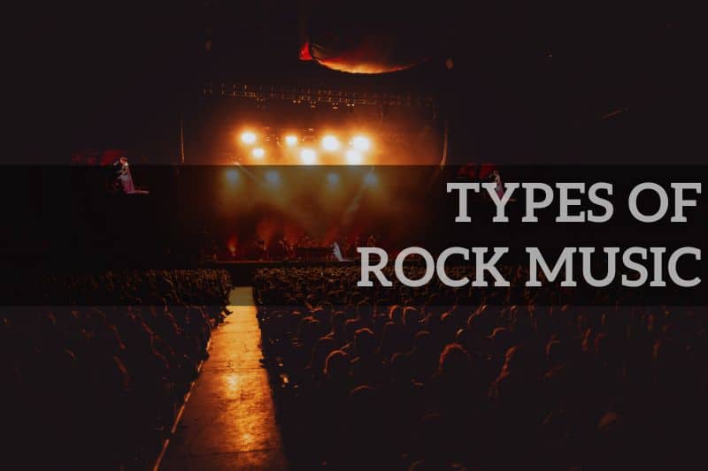 Types of rock music: A rock band performing on the stage with bright lights to a large crowd