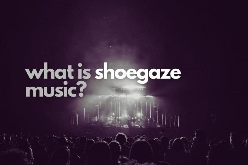 What is shoegaze music: A large crowd of fans watching a band perform on a stage with bright lights.