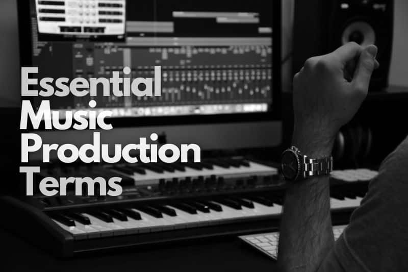 A producer sitting in his studio, working on his digital audio workstation. By understanding the basic music production terms, he's able to learn concepts that help take his productions to the next level.